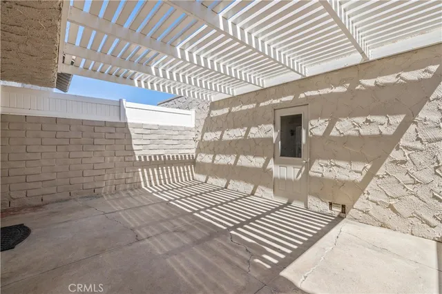 a view of a porch with wooden floor