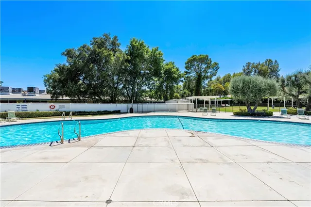 a view of a park with large trees