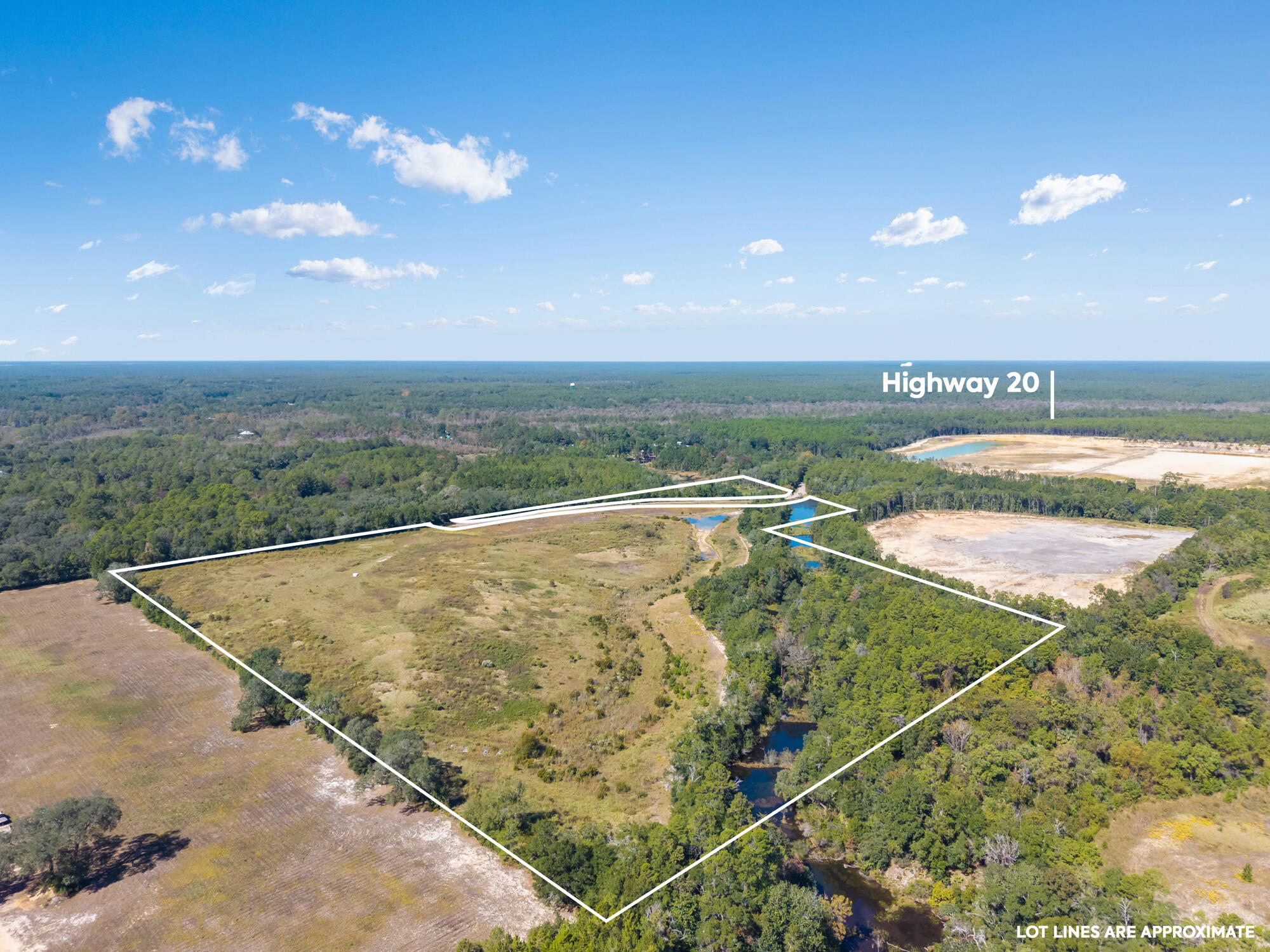 a view of a swimming pool with an outdoor seating