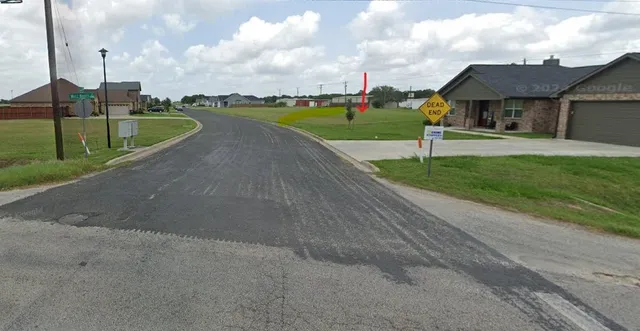 a view of a house with a swimming pool