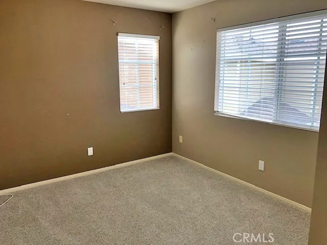 a view of a room with a window