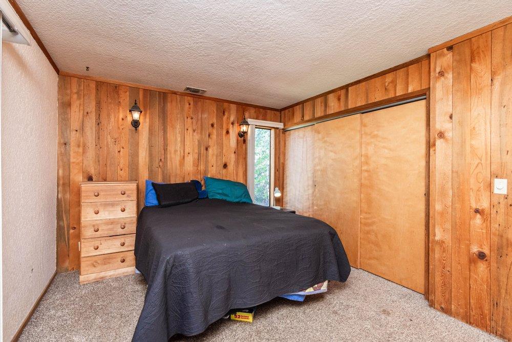 23870 Tokayana Way Colfax, CA 95713 - Photo 44 of 93 a bedroom with a bed and a cabinet