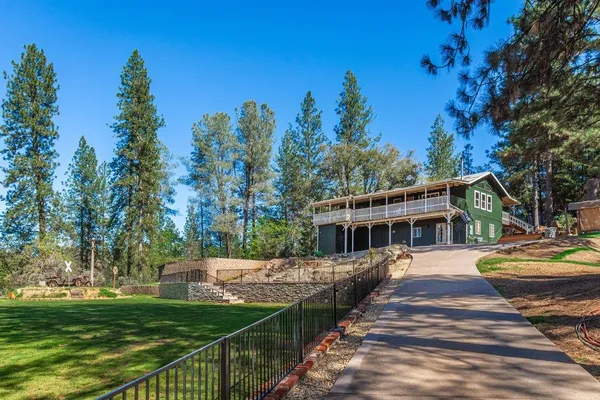 a view of swimming pool with a yard
