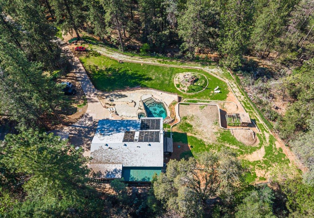 23870 Tokayana Way Colfax, CA 95713 - Photo 82 of 93 an aerial view of a house with a yard and garden