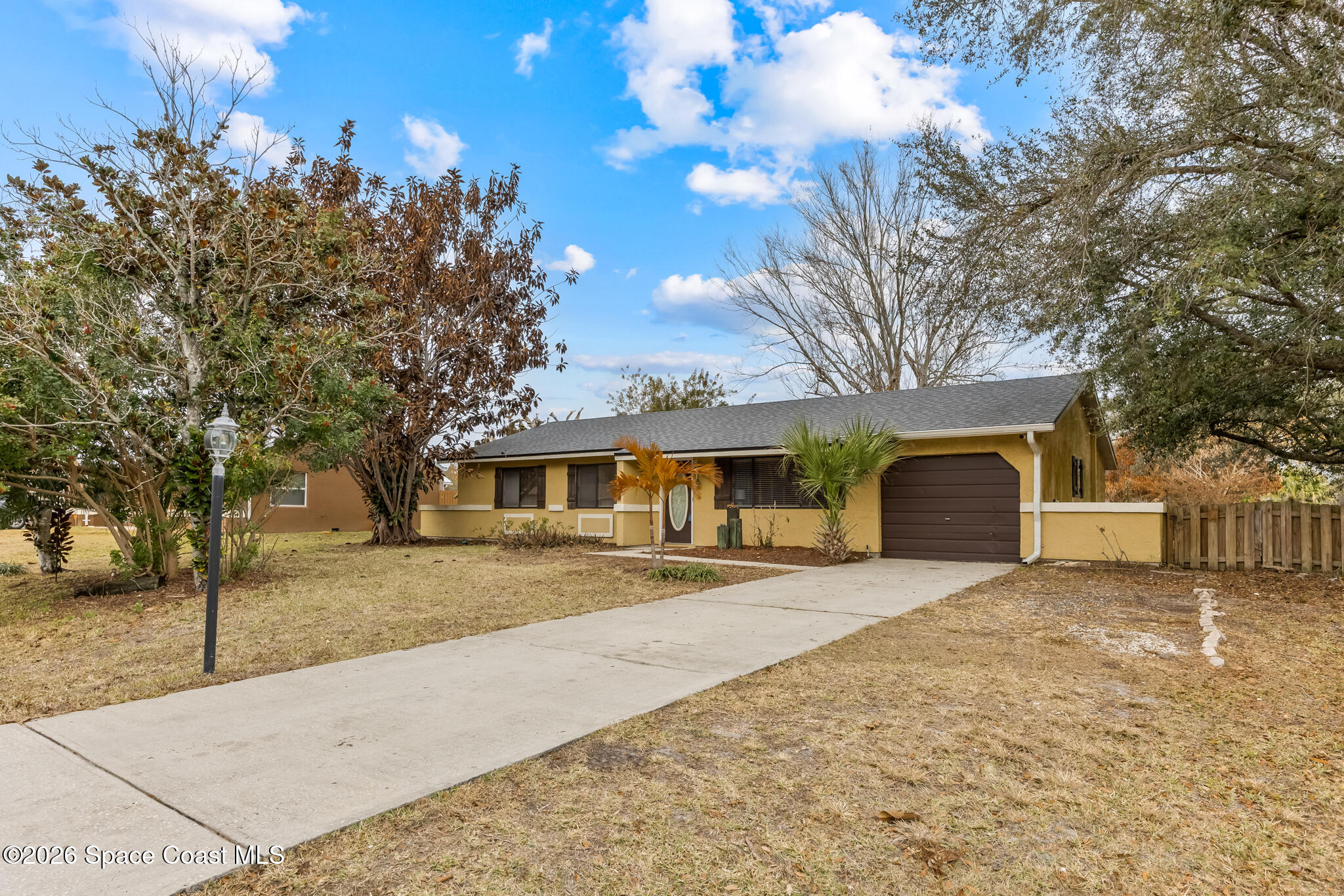 701 Rostock Circle Northwest Palm Bay, FL 32907 - Photo 1 of 25 PRIVATE SIDE LOT