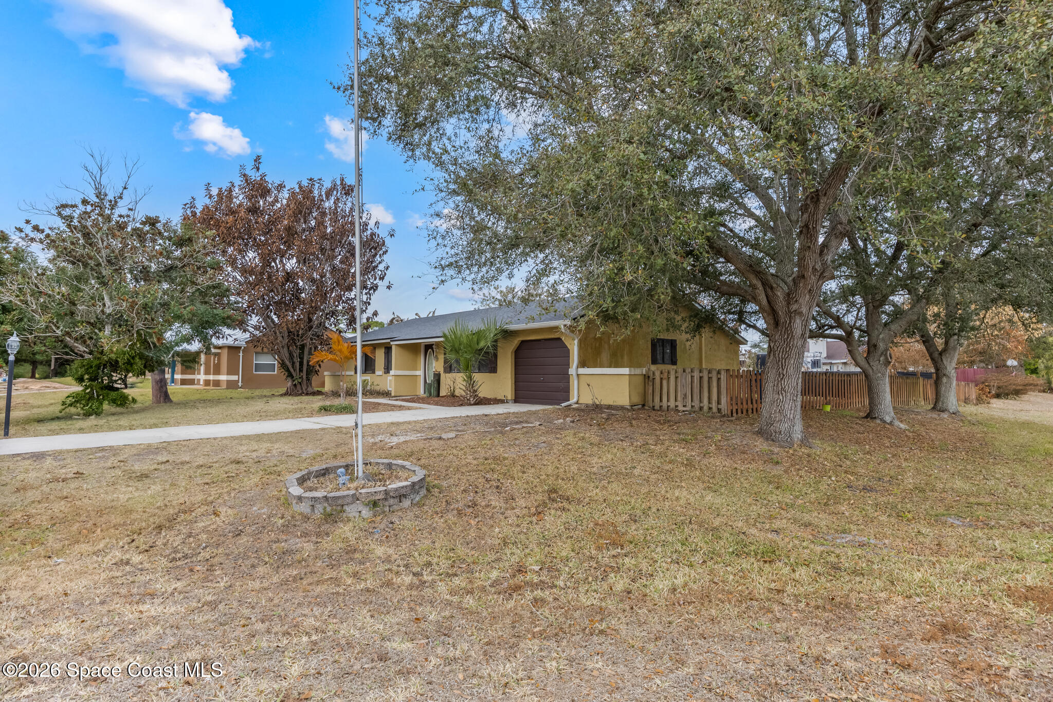 701 Rostock Circle Northwest Palm Bay, FL 32907 - Photo 3 of 25 FULLY FENCED