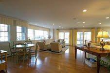 80 Salten Point Road Barnstable, MA 02630 - Photo 3 of 21 a very nice looking living room with dining room and a large window