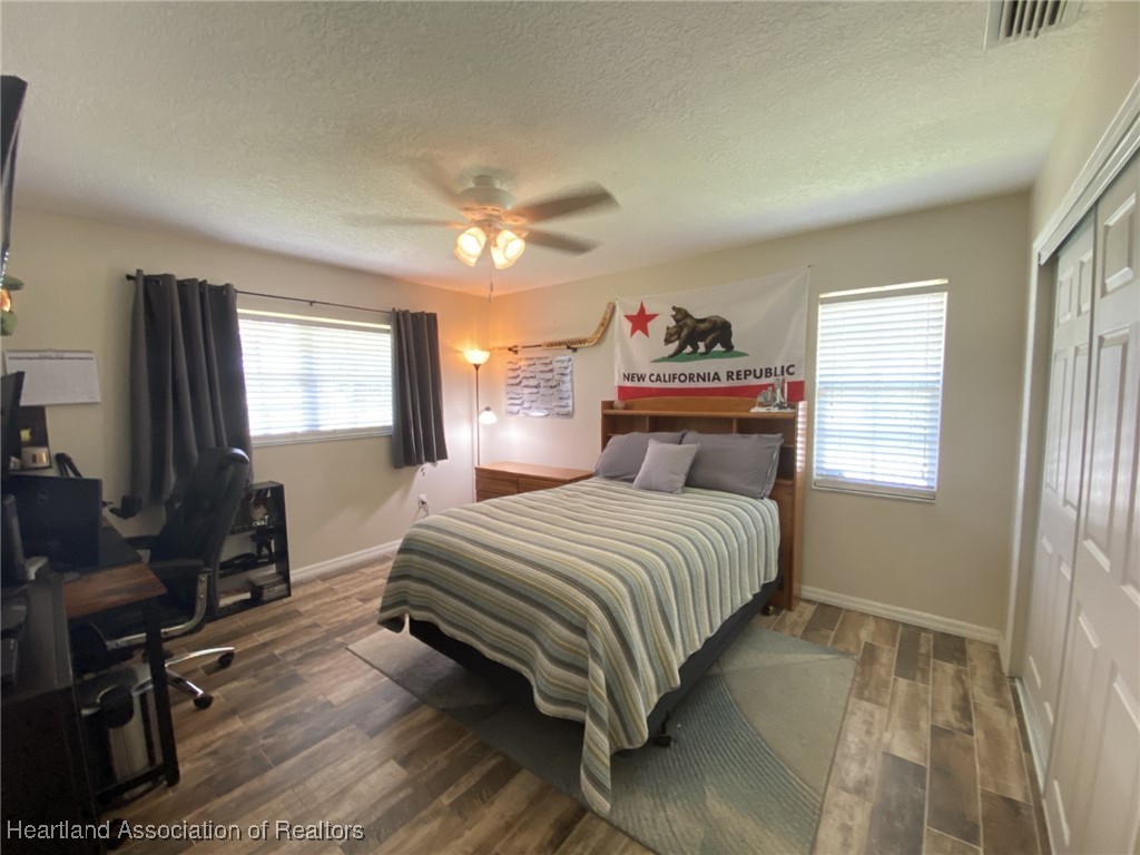 2633 Cheyenne Road Sebring, FL 33875 - Photo 27 of 50 Back guest bedroom with tile floors