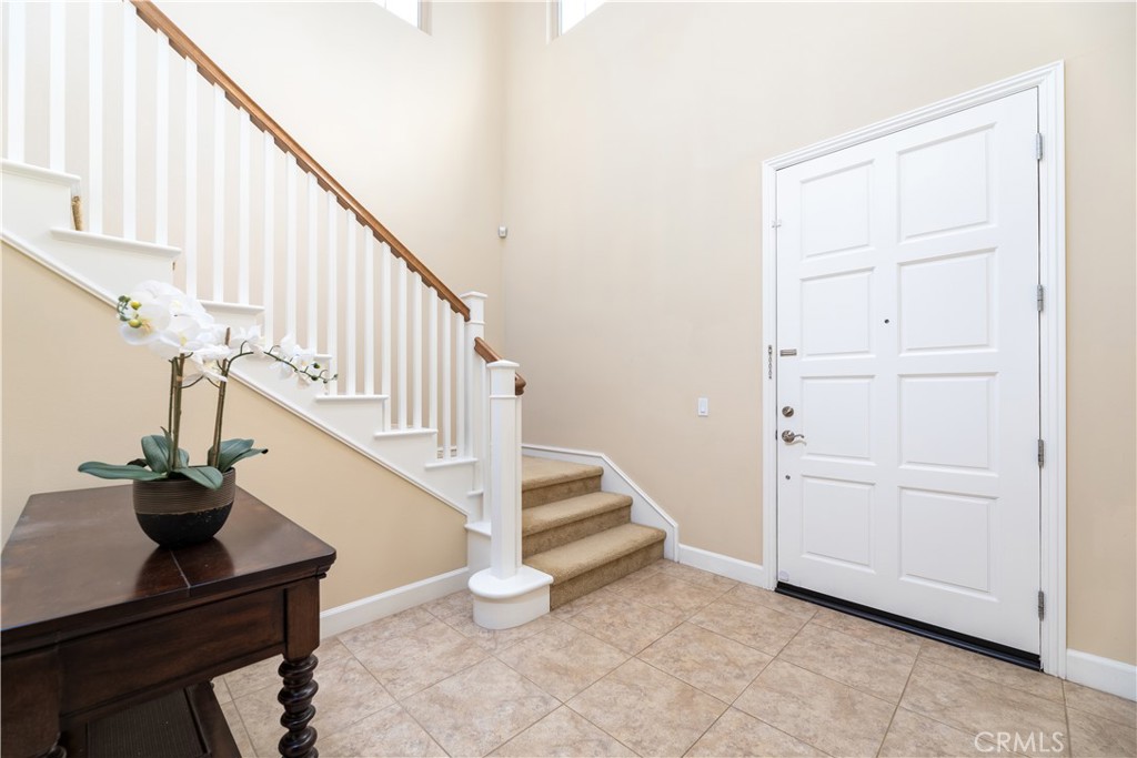 71 Thornapple Irvine, CA 92620 - Photo 11 of 33 a view of entryway and hall with wooden floor
