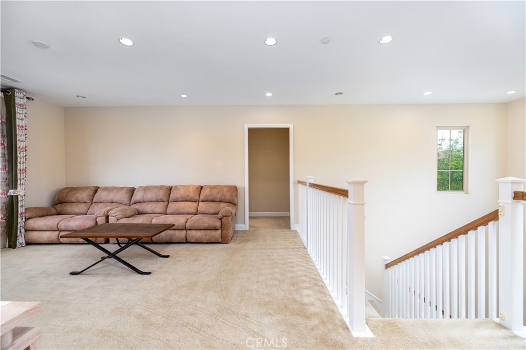 71 Thornapple Irvine, CA 92620 - Photo 17 of 33 a living room with furniture and a window