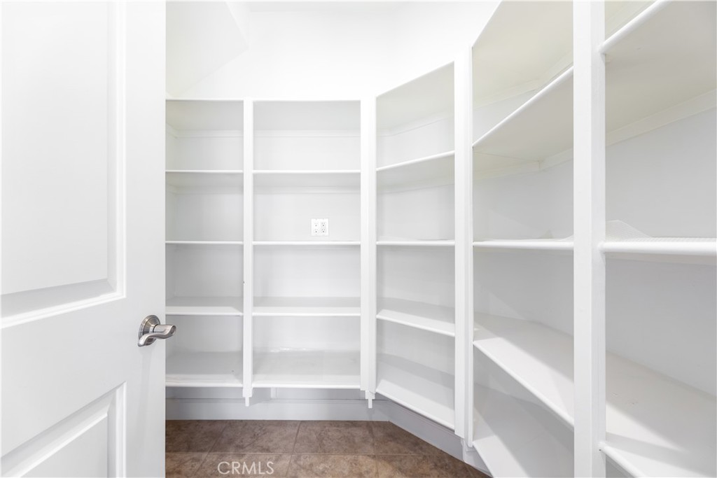 71 Thornapple Irvine, CA 92620 - Photo 19 of 33 a room with walk in closet with empty racks