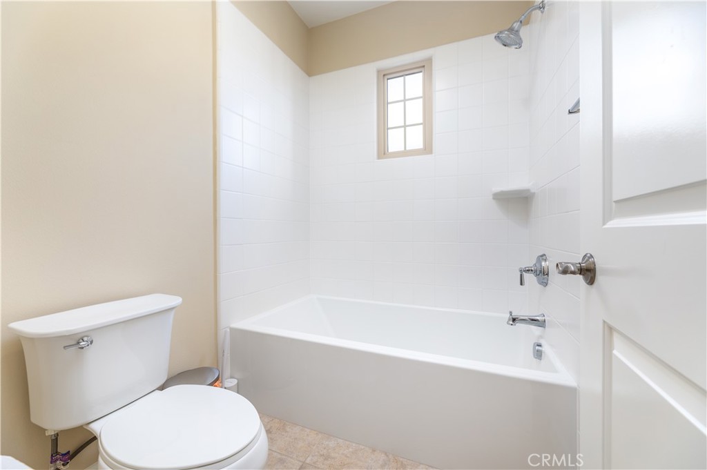 71 Thornapple Irvine, CA 92620 - Photo 23 of 33 a white toilet sitting next to a bath tub
