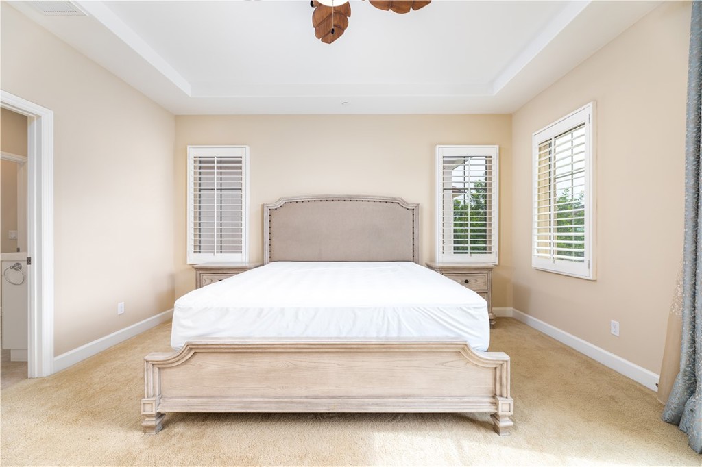 71 Thornapple Irvine, CA 92620 - Photo 24 of 33 a bedroom with a bed and window