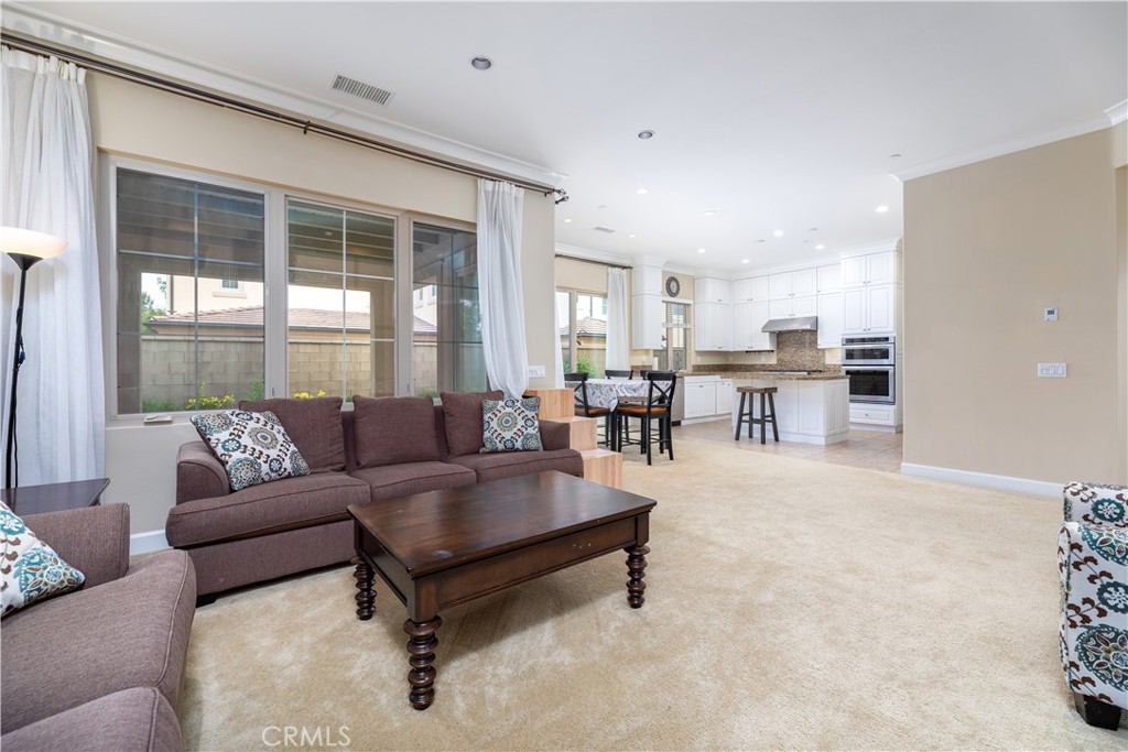 71 Thornapple Irvine, CA 92620 - Photo 29 of 33 a living room with furniture and a table