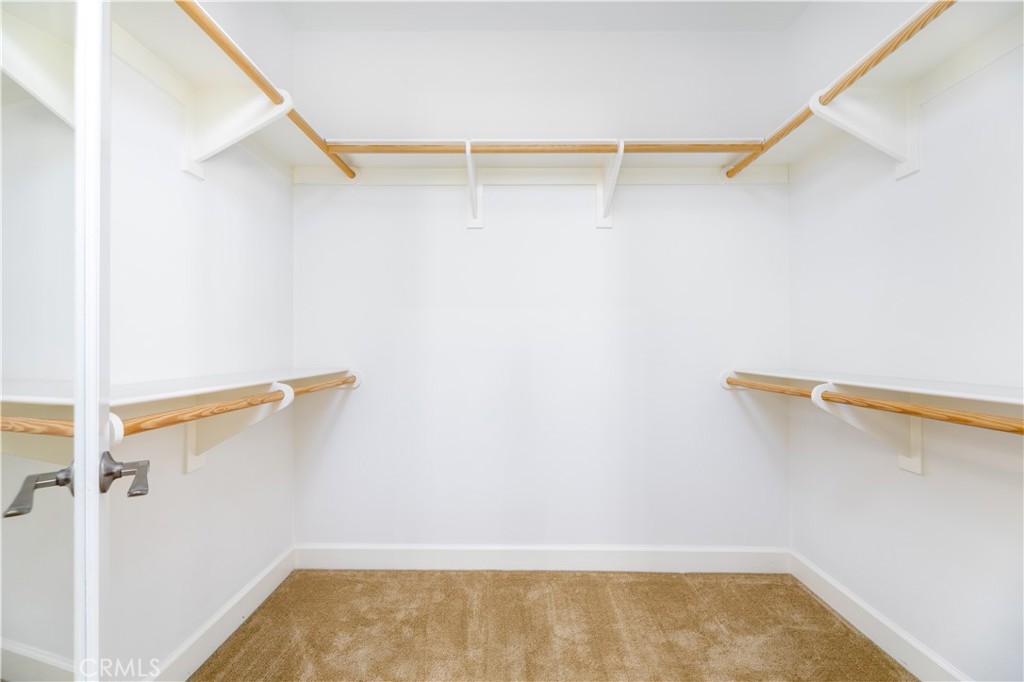 71 Thornapple Irvine, CA 92620 - Photo 5 of 33 a view of a room with racks on the wall