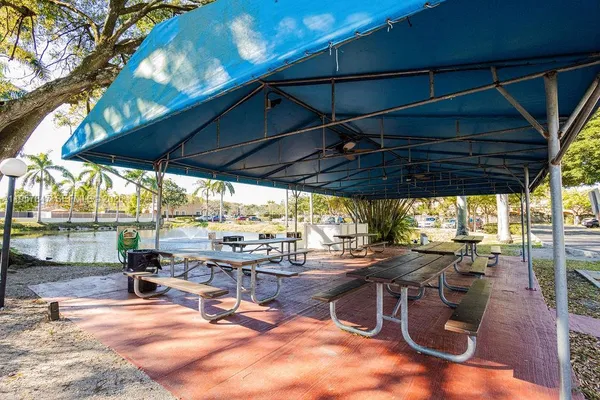 a view of street with parked cars