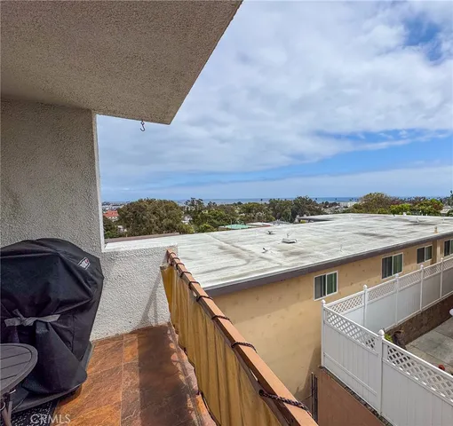 a view of a balcony with an outdoor space