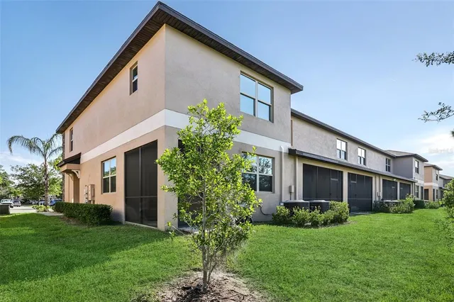 a aerial view of a house with a yard