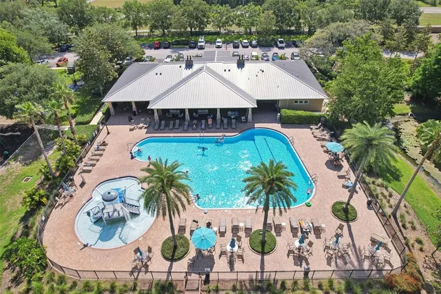 a view of a yard with wooden floor and lake view