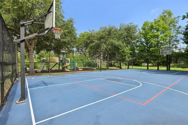 a balcony with wooden floor and lake view