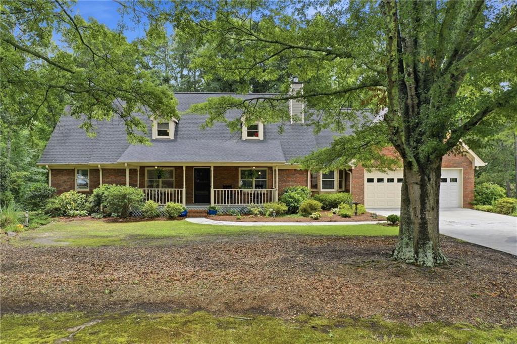 4891 Bill Cheek Road Auburn, GA 30011 - Photo 9 of 99 a front view of a house with a yard