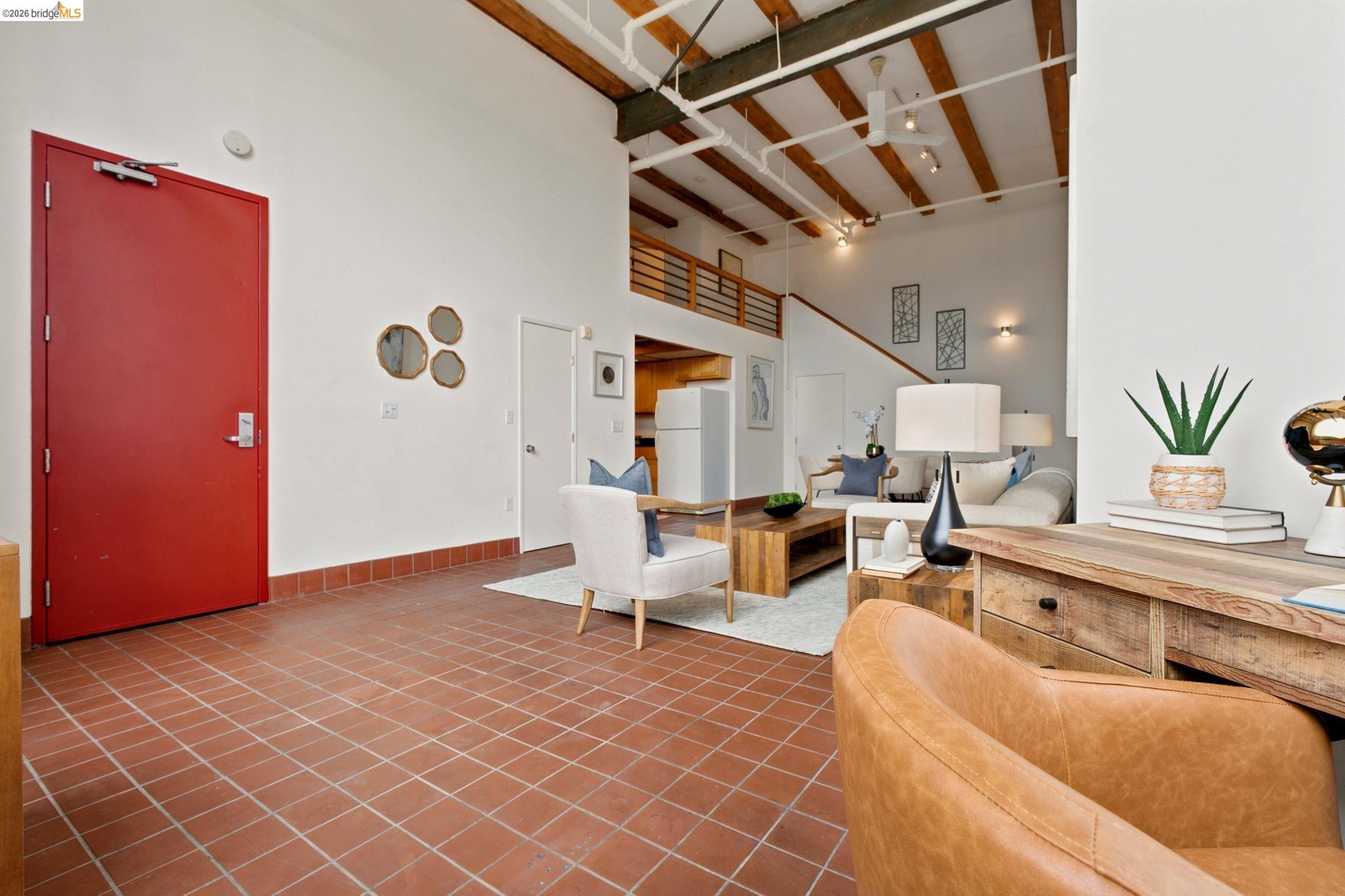 1920 Union Street, Unit 9 Oakland, CA 94607 - Photo 6 of 35 Vaulted ceilings with exposed wood beams and white-painted ductwork