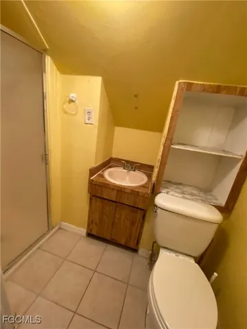 a bathroom with a toilet and a sink