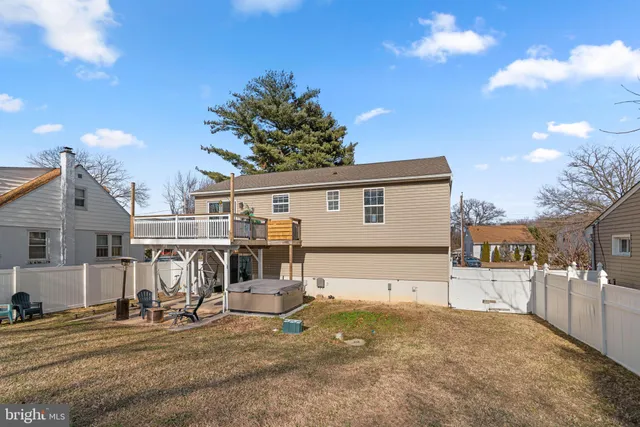 a view of a house with snow in front of it