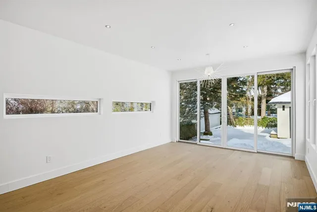 a view of cabinets and window