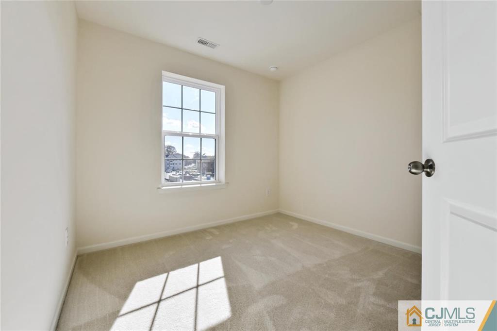 45 Iron Gate Road Sicklerville, NJ 08081 - Photo 22 of 25 a view of an empty room with a window