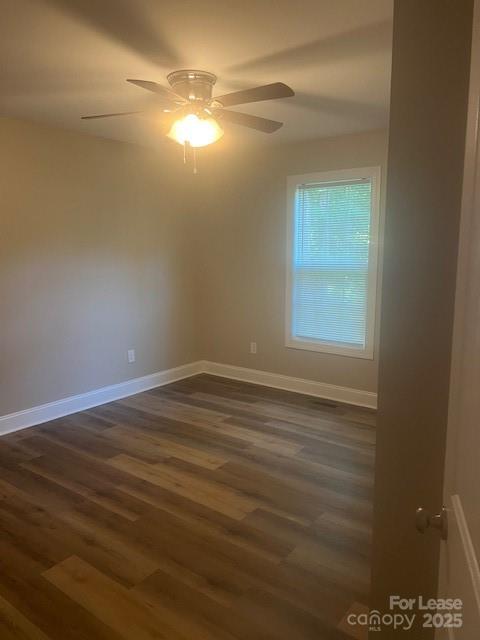 114 Dove Meadow Lane Statesville, NC 28625 - Photo 5 of 6 a view of a room with wooden floor and windows