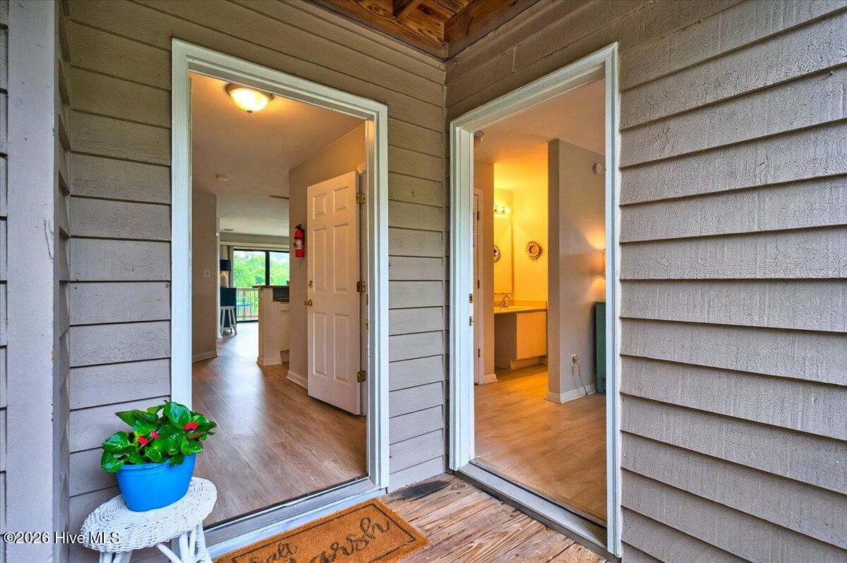 816 Colony Place Southwest, Unit D Sunset Beach, NC 28468 - Photo 5 of 55 Lock-out on right to private bedroom/bath/porch