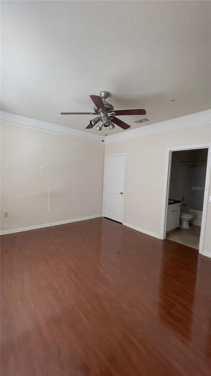 8849 Villa View Circle, Unit 206 Orlando, FL 32821 - Photo 8 of 19 a view of a room with wooden floor