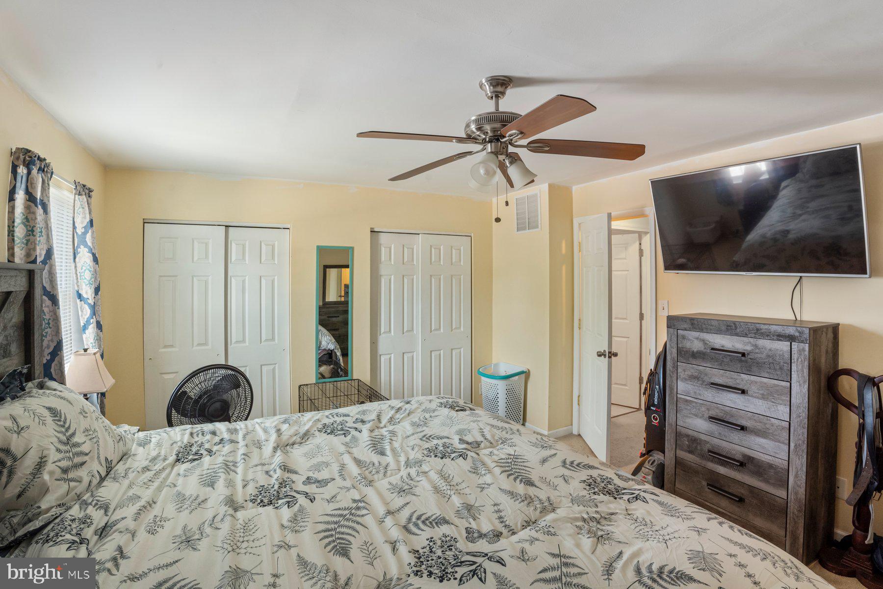 120 Danford Drive Elkton, MD 21921 - Photo 12 of 25 a bedroom with a bed and a flat screen tv