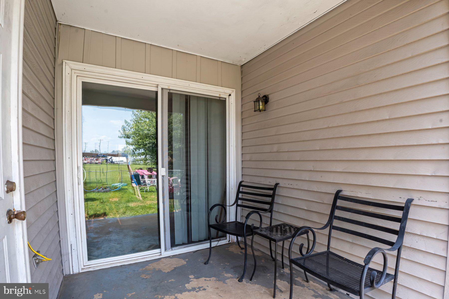 120 Danford Drive Elkton, MD 21921 - Photo 20 of 25 a backyard of a house with outdoor seating
