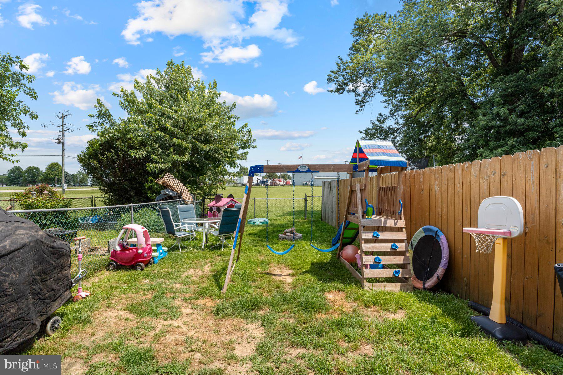 120 Danford Drive Elkton, MD 21921 - Photo 21 of 25 a backyard of a house with table and chairs