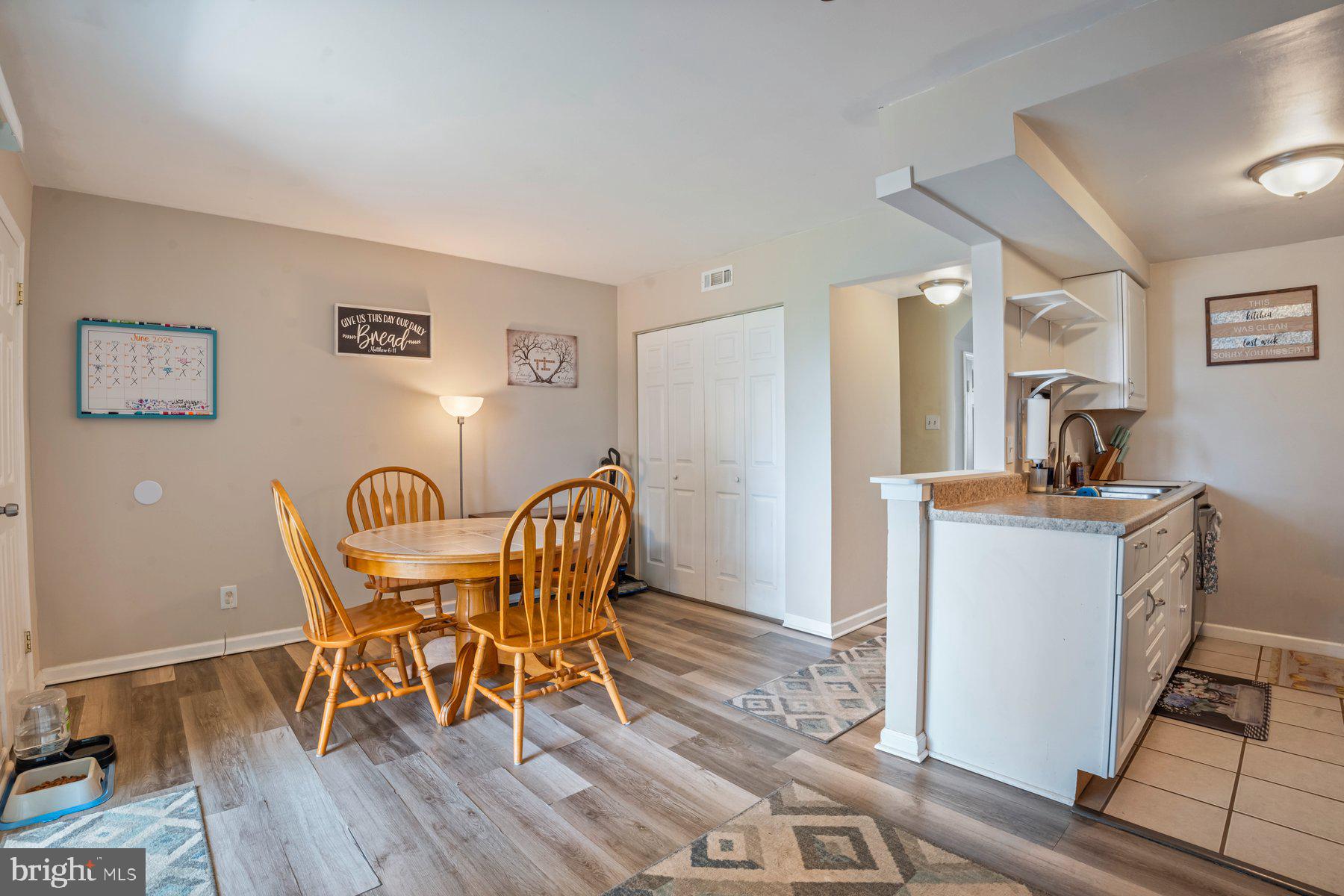 120 Danford Drive Elkton, MD 21921 - Photo 7 of 25 a view of a dining room with furniture a rug and wooden floor
