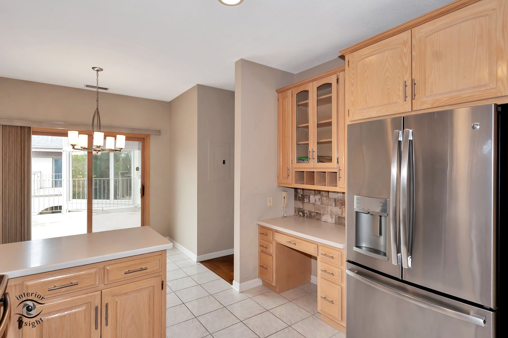 891 Exeter Turn, Unit A2 Bourbonnais, IL 60914 - Photo 17 of 29 a kitchen with stainless steel appliances a refrigerator and a sink