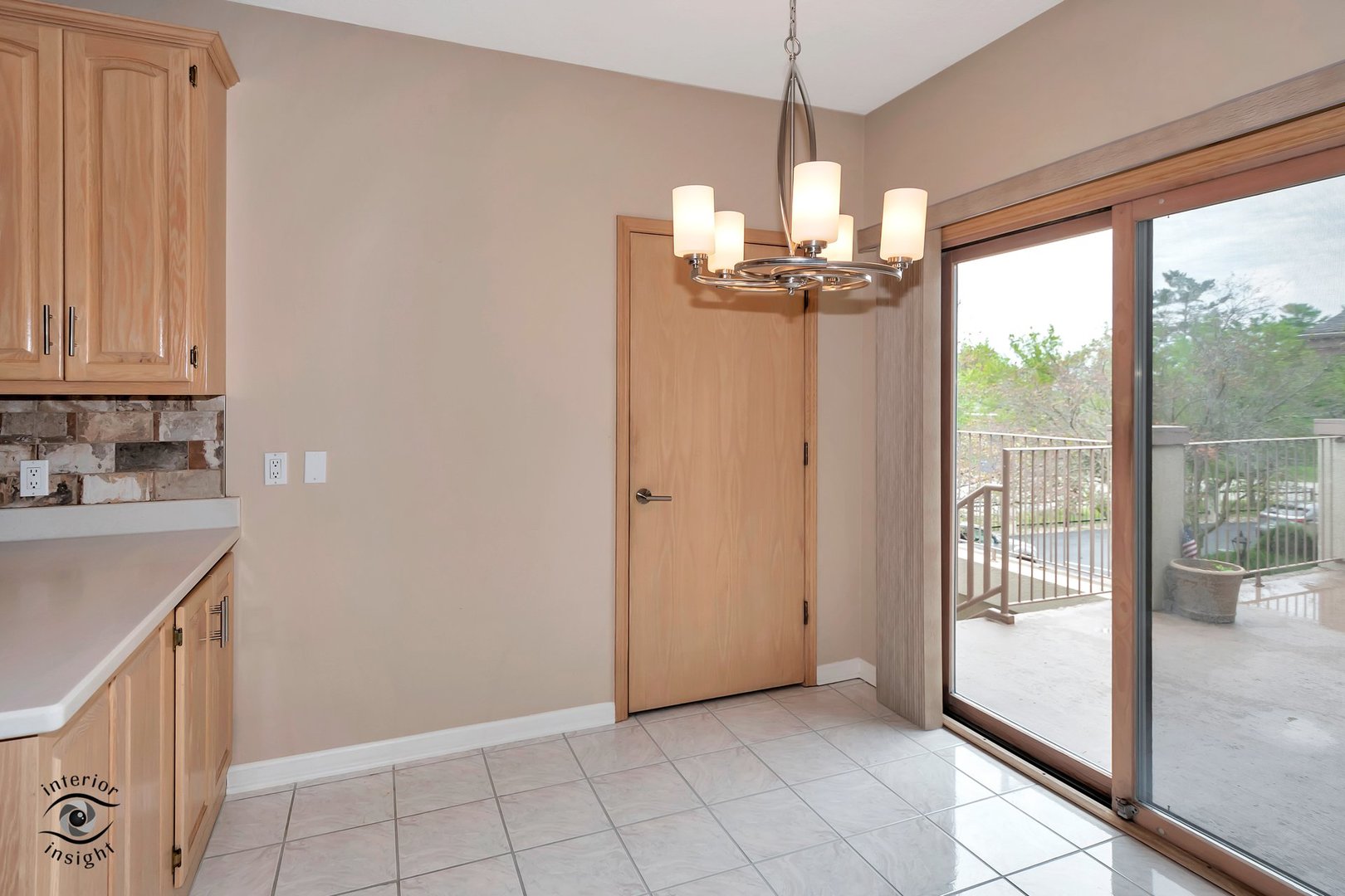891 Exeter Turn, Unit A2 Bourbonnais, IL 60914 - Photo 18 of 29 a view of a kitchen with a sink and wooden floor