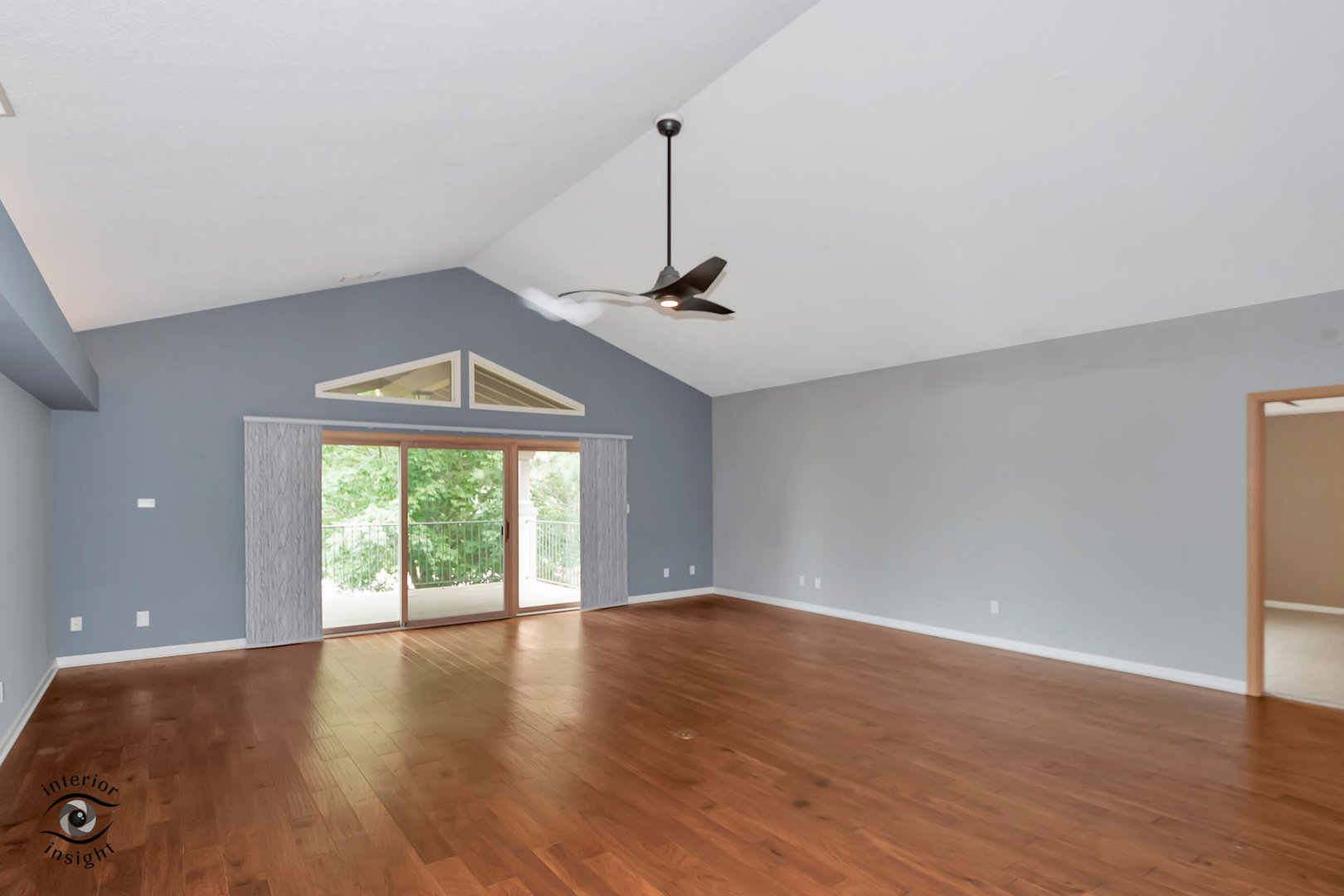 891 Exeter Turn, Unit A2 Bourbonnais, IL 60914 - Photo 20 of 29 an empty room with wooden floor and windows