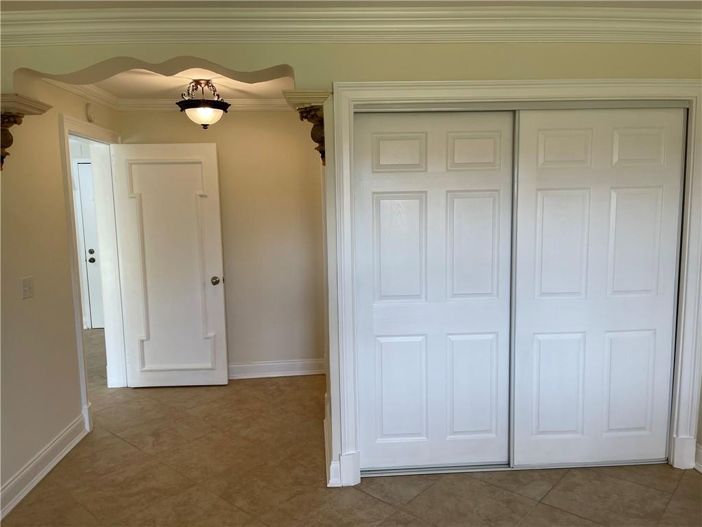 491 Racquet Club Road, Unit 109 Weston, FL 33326 - Photo 19 of 39 a view of a livingroom with closet