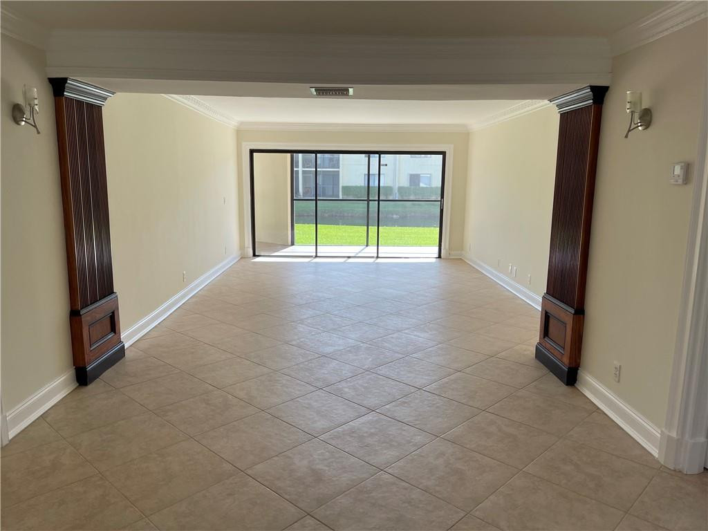 491 Racquet Club Road, Unit 109 Weston, FL 33326 - Photo 3 of 39 a view of an empty room with a window