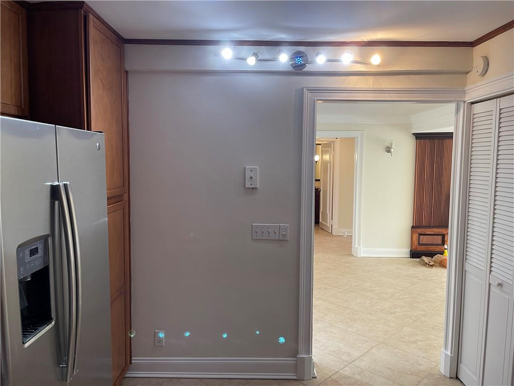 491 Racquet Club Road, Unit 109 Weston, FL 33326 - Photo 32 of 39 a view of a hallway with wooden floor