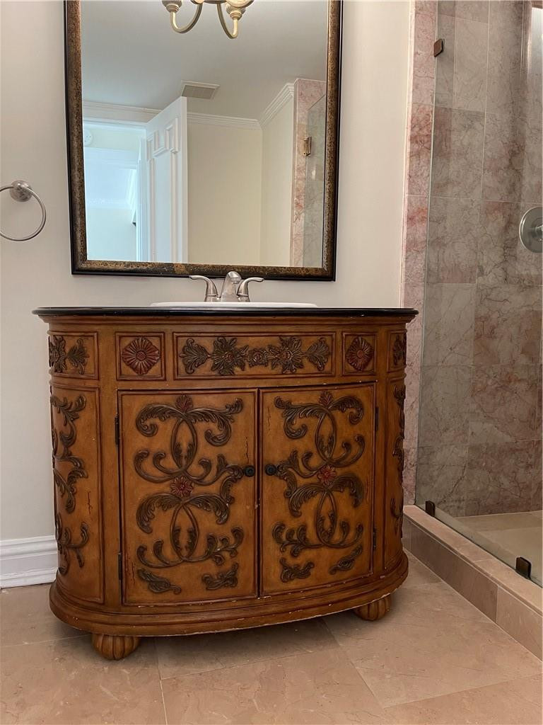 491 Racquet Club Road, Unit 109 Weston, FL 33326 - Photo 33 of 39 a bathroom with a mirror