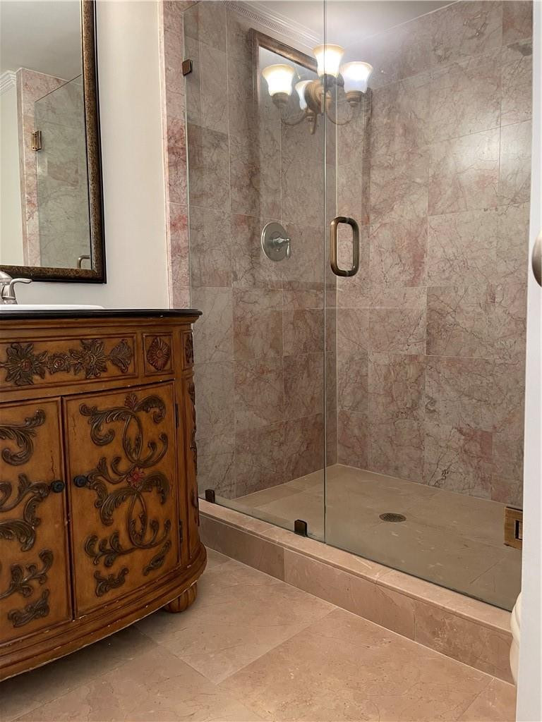 491 Racquet Club Road, Unit 109 Weston, FL 33326 - Photo 34 of 39 a bathroom with a shower and a sink
