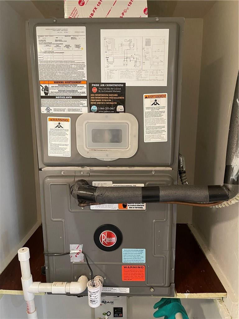 491 Racquet Club Road, Unit 109 Weston, FL 33326 - Photo 39 of 39 a utility room with a stove and a microwave