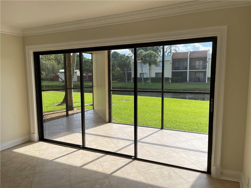 491 Racquet Club Road, Unit 109 Weston, FL 33326 - Photo 7 of 39 a view of an empty room and window