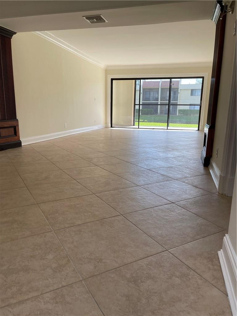 491 Racquet Club Road, Unit 109 Weston, FL 33326 - Photo 10 of 39 a view of an empty room with window
