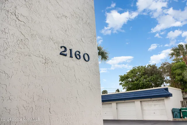 a view of a swimming pool with an outdoor seating