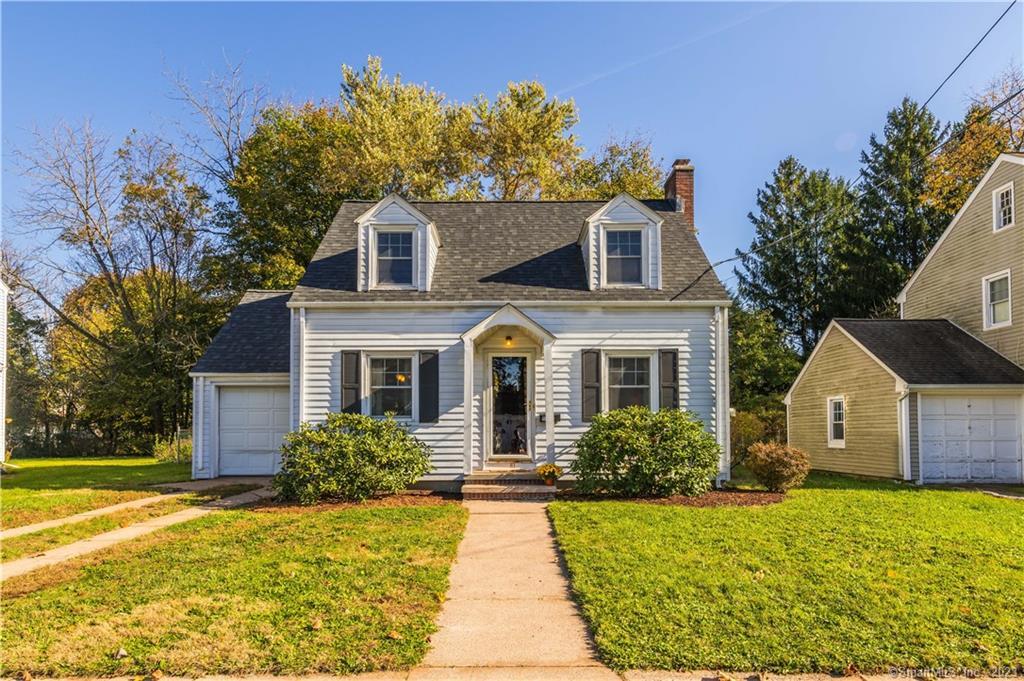 61 Rochford Avenue Hamden, CT 06514 - Photo 1 of 1 a front view of a house with garden